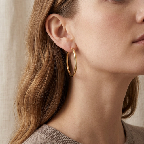 1 1/4 Inch 14kt Yellow Gold Hollow Hoop Earrings With Bar Lock Closure
