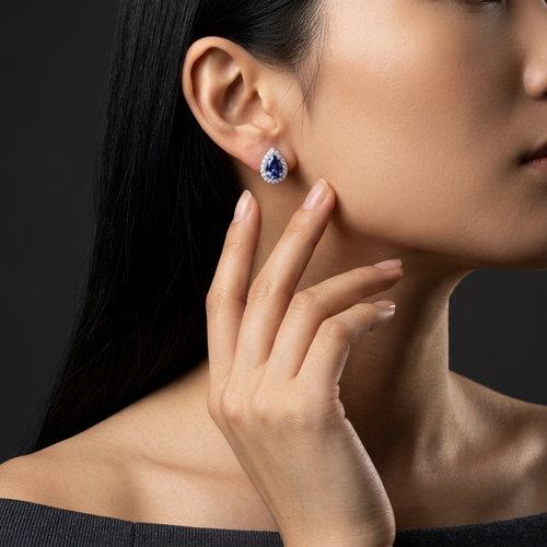 1.10 Carat Pear Cut Tanzanite And .80 Carat Round Cut Diamond 14kt Halo Earrings