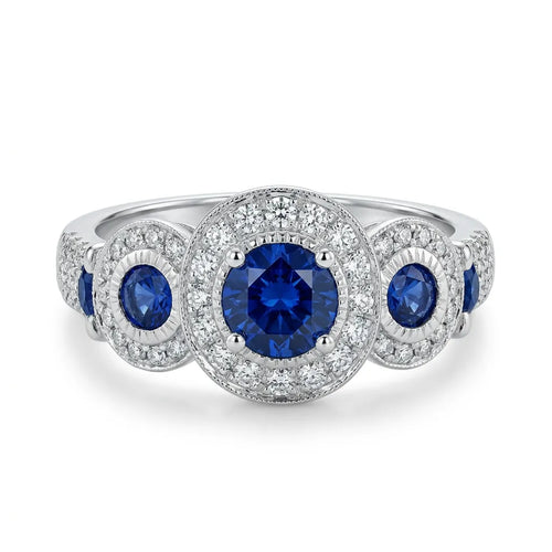 2.45 Carat Round And Trillion Cut Blue Sapphire And 0.70 Carat Round Cut Diamond Platinum Ring