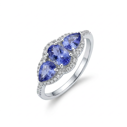 Oval And Pear Cut Tanzanite And .11 Carat Diamond 14kt Three Stone Ring