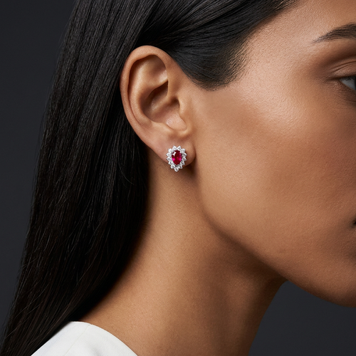 .87 Carat Oval Cut Ruby And .48 Carat Round Cut Diamond 14kt Earrings