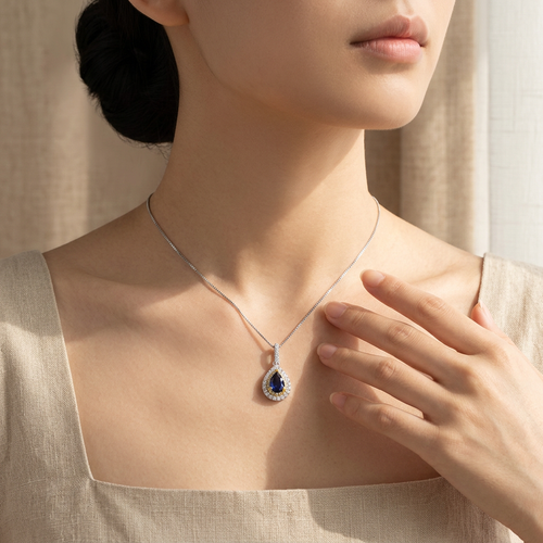 .92 Carat Pear Shape Ceylon Sapphire And .40 Carat Round Cut Diamond Pendant