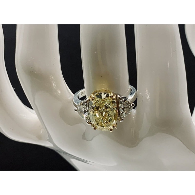 Cooper Jewelers Fancy Yellow Oval with Side Diamonds in