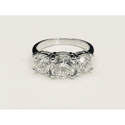 Cooper Jewelers Three Round Diamonds in Platinum Setting